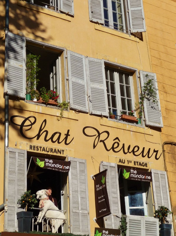 A goat on a balcony ?