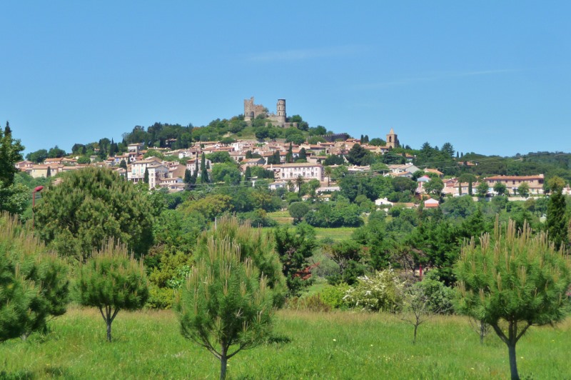 Grimaud village, a lovely supermarket car park view....