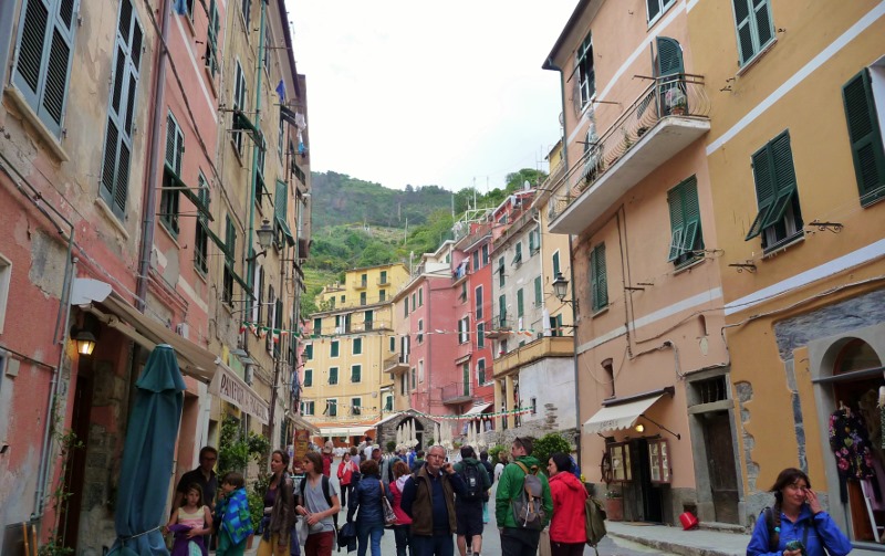 Note the buildings are one story higher and the balcony is on the third floor (