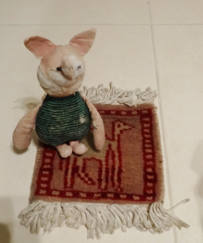  Piglet on a prayer mat