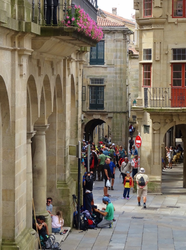  Hikers queuing for the certificate of completion of the Camino trek