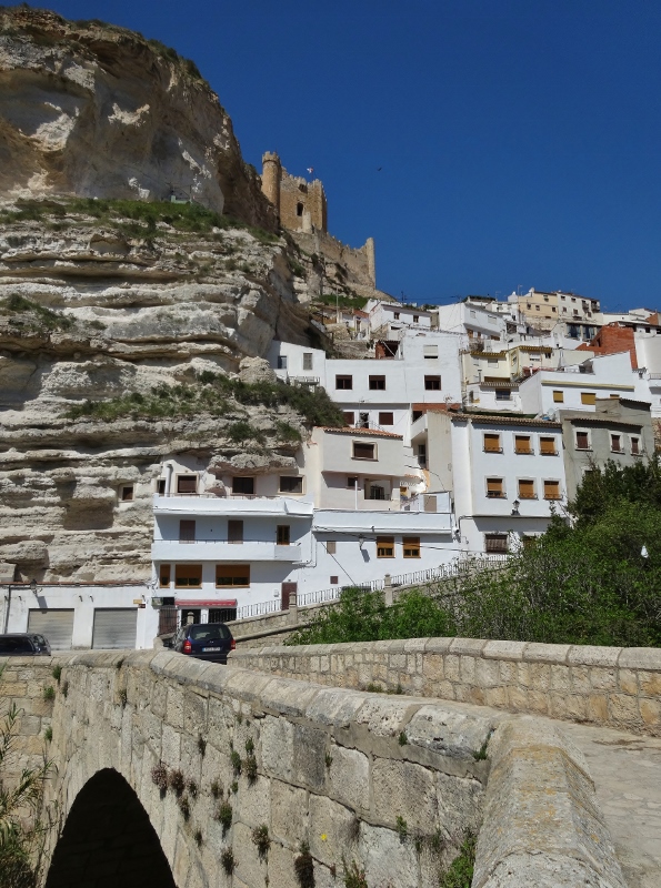 The castle and some cave houses in Alcala del Júcar