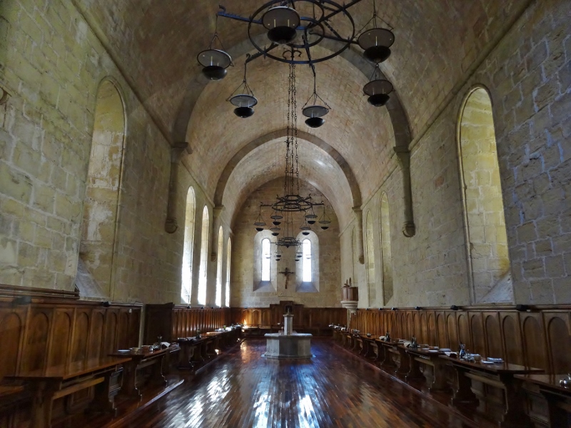 The table laid ready for dinner in the refectory