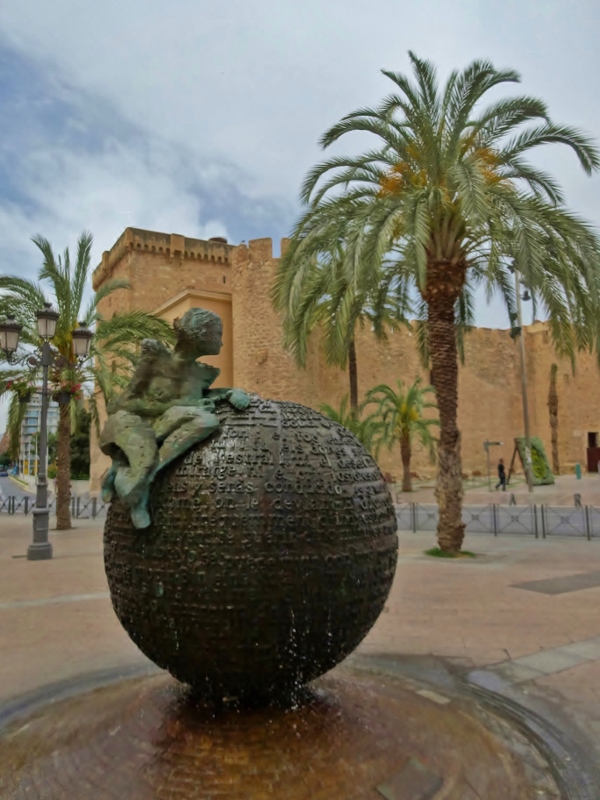 A poetry covered fountain opposite the Alcassar