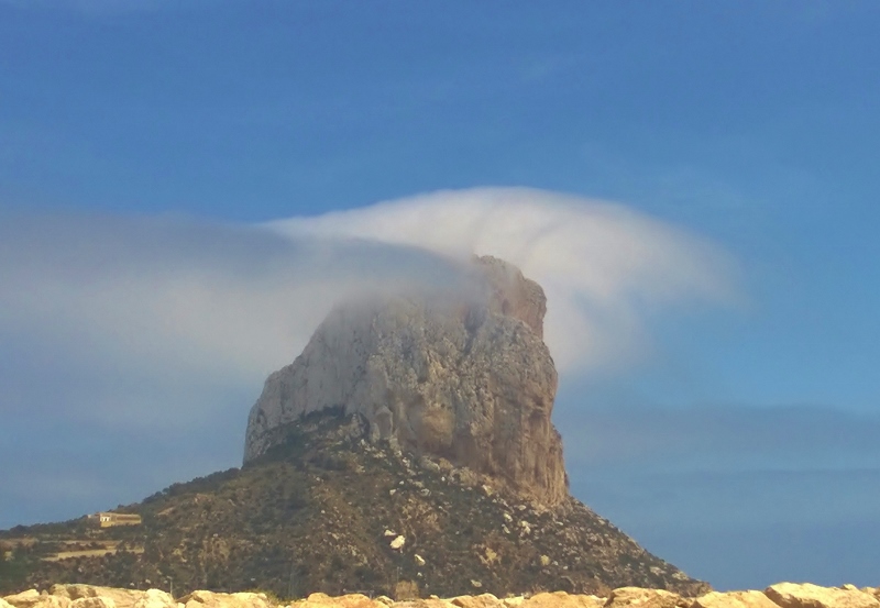The Peñón de Ifach with a small cloud caught on top