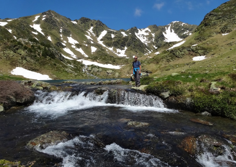 A waterfall pouring out of one of the lakes