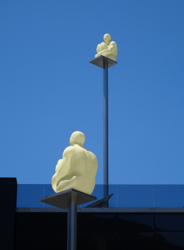 Men on poles in Andorra La Vella