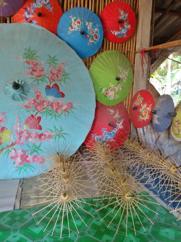 Delicately painted umbrellas by local ladies
