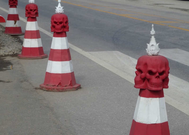 Road traffic cones by Wat Rong Khun, Chiang Rai