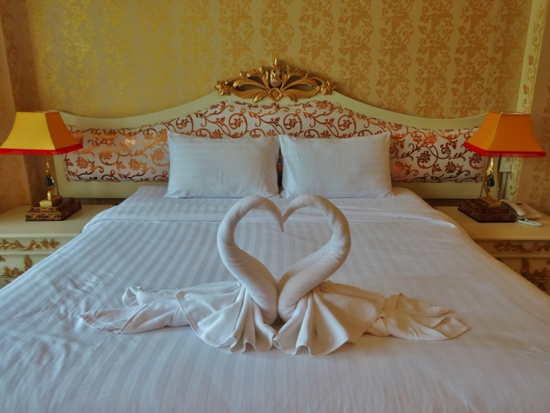 Towel swans on our bed